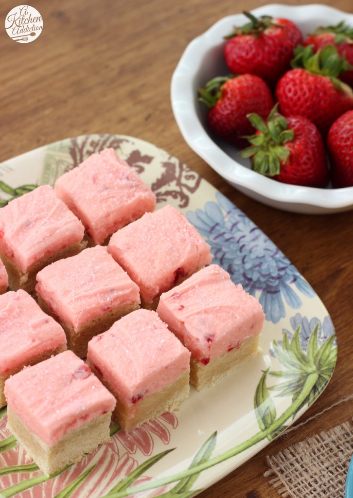 Strawberry Lemonade Frosted Sugar Cookie Bars - A Kitchen Addiction