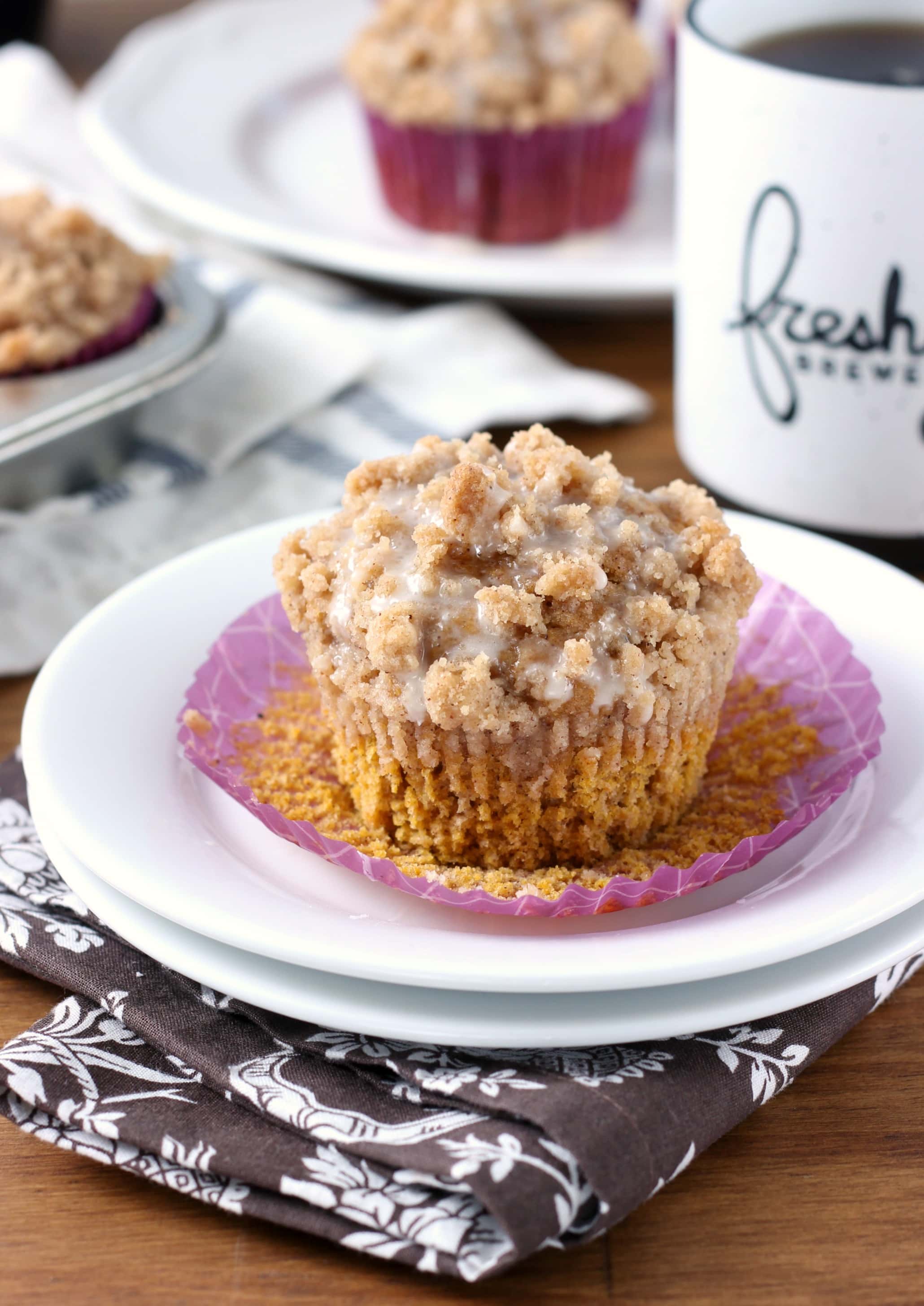 Pumpkin Coffee Cake Muffins with Maple Glaze - A Kitchen Addiction