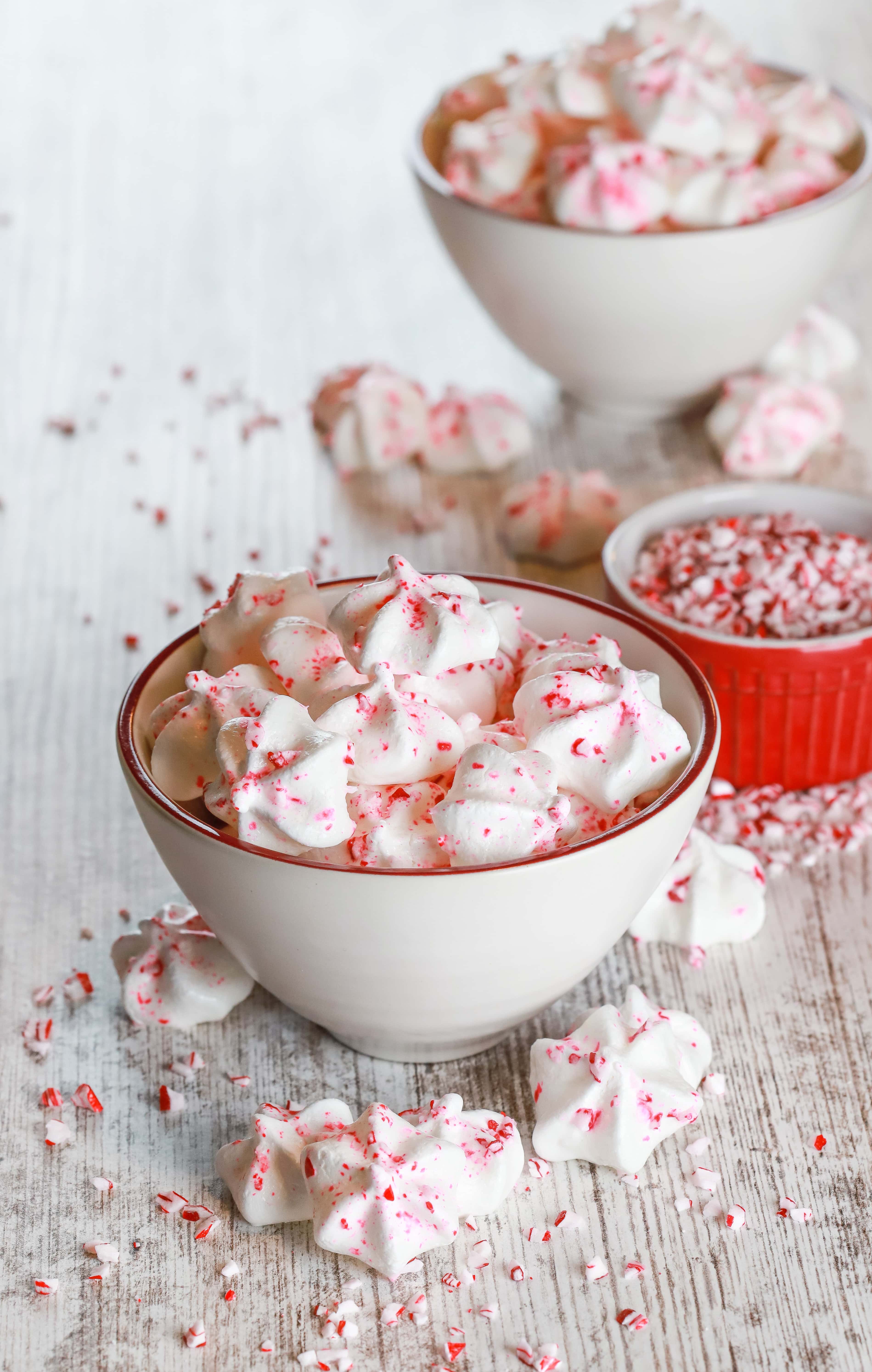 Bowl of Mini Peppermint Meringue Cookies. Recipe from A Kitchen Addiction